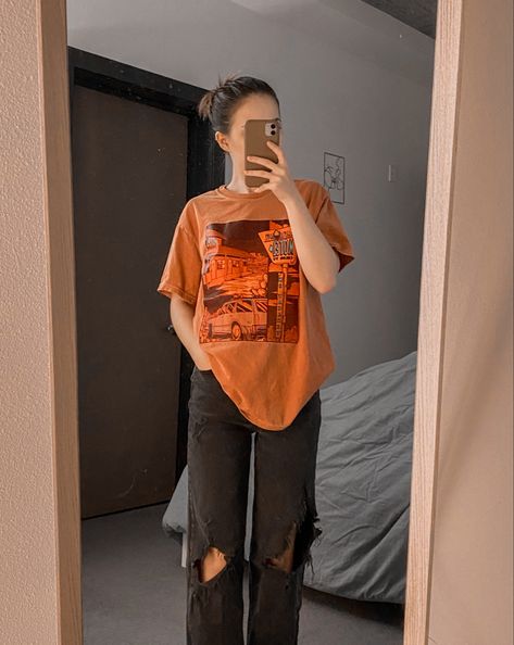 oversized baggy tshirt orange black ripped jeans women’s fashion outfit summer inspo aesthetic OOTD Orange Oversized Shirt Outfit Women, Orange Shirt Outfit Ideas, Orange And Black Outfit Aesthetic, Orange Grunge Outfit, Orange Tshirt Outfits, Pooja Thakur, Oversized Tshirt Outfit Women, Baggy Tshirt Outfit, Orange Shirt Outfit