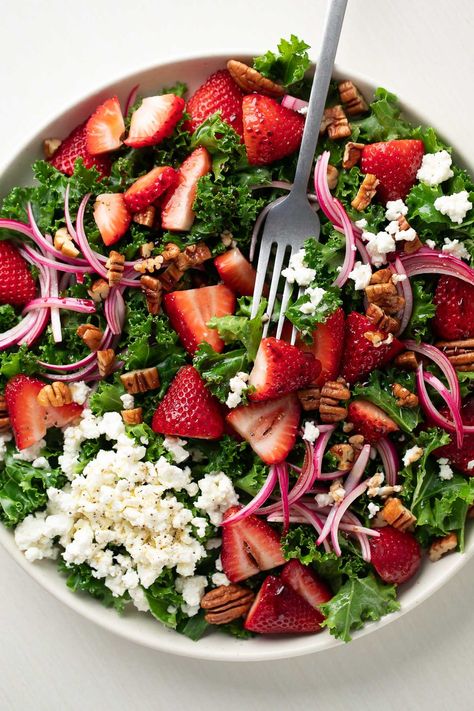 This fresh and delicious Strawberry Feta Kale Salad features tender massaged kale topped with juicy strawberries, red onion, feta, and pecans tossed in a tasty balsamic dressing. Kale Dressing, Easy Kale Salad, Nutritious Meal Ideas, Strawberry Feta Salad, Cheese Sauce For Broccoli, Strawberry Feta, Chicken Quinoa Salad, Broccoli Cauliflower Salad, Fried Goat Cheese