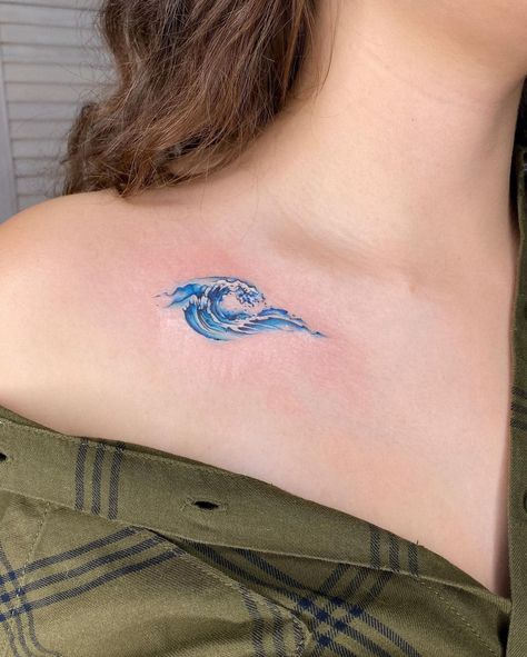 Blue Wave Tattoo, Wave Tattoos For Women, Watercolor Wave Tattoo, Water Themed Tattoos, Small Travel Tattoos, Tattoo Ideas Aesthetic, Wave Tattoos, Colour Tattoo For Women, Wave Tattoo Design