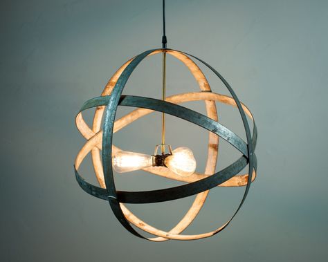 These handmade globe-shaped chandeliers made from rusty metal rings are a perfect blend of modern and rustic Edison Bulb Chandelier, Wine Barrel Ring, How To Make A Chandelier, Wine Barrel Rings, Bulb Chandelier, Barrel Ring, Barrel Rings, Ring Chandelier, Wine Country California