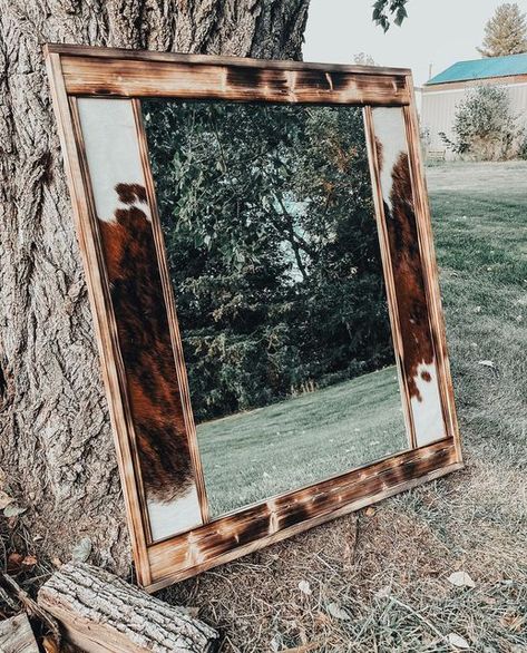 Western Style Mirrors, Cow Hide Mirror Frame, Burnt Card Mirror Western, Cowhide Mirror Frame, Cowhide Mirror Frame Diy, Diy Cowhide Projects, Big Mirror Aesthetic, Cow Hide Mirror, Cowhide Bedroom Ideas