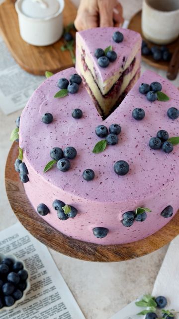 Camila Hurst on Instagram: "Blueberry cake layers filled with Blueberry Jam, frosted with Blueberry Cream Cheese Frosting. This cake has such a fluffy texture and is bursting with juicy blueberry flavor.💕" Lemon Blueberry Birthday Cake, Blueberry Smash Cake, Blueberry Birthday Cake, Camila Hurst, Blueberry Cream Cheese Frosting, Blueberry Birthday, Blueberry Yogurt Cake, Peach Cake Recipes, Layer Cake Filling