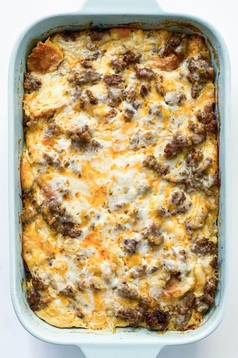 Make ahead this Best Sausage Breakfast Casserole made with eggs, and cheese, sourdough bread. Perfect weekend breakfast casserole! #bestsausagebreakfastcasserole #breakfastcasserole #reluctantentertainer Breakfast Egg Sausage Casserole, Breakfast Ideas With Eggs And Sausage, Sausage Bread Breakfast Casserole, Best Sausage Breakfast Casserole, Egg And Sausage Casserole Recipes, Breakfast Meat Casserole, Egg And Meat Breakfast Casserole, Southern Breakfast Casserole, Breakfast Casserole Make Ahead Sausage