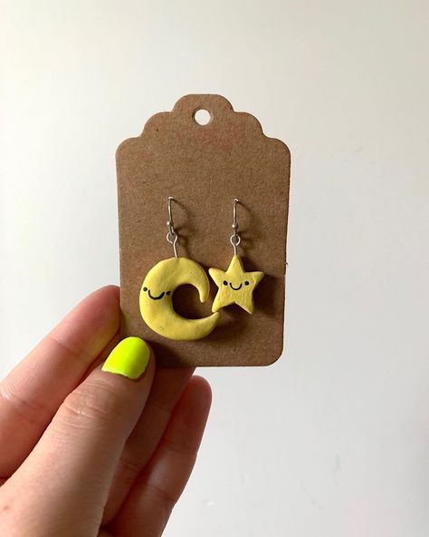 Danielle Fessler on Instagram: “SOLD!!! moon and star clay earrings - $10 - available on my etsy (link in bio) • • • • #erinissoartsy #moon #star #earrings #clay #handmade…” Paper Stars, Polymer Jewelry, Star Jewelry, Star Earrings, Polymer Clay Crafts, Cute Earrings, Stars And Moon, Clay Jewelry, Clay Earrings