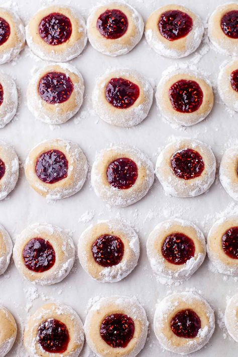 Classic Thumbprint Cookies are a flakey buttery shortbread cookie filled with your favorite jam and baked to perfection. A delicate outer cookie with chewy jam center. Jolly Jammer Cookies, Old Fashion Thumbprint Cookies, Pressed Butter Cookies, Best Thumbprint Cookies With Icing, Jam Filled Shortbread Cookies, Finger Print Cookies With Jam, Small Cookies Ideas, Jam Cookies Thumbprint, Cranberry Thumbprint Cookies