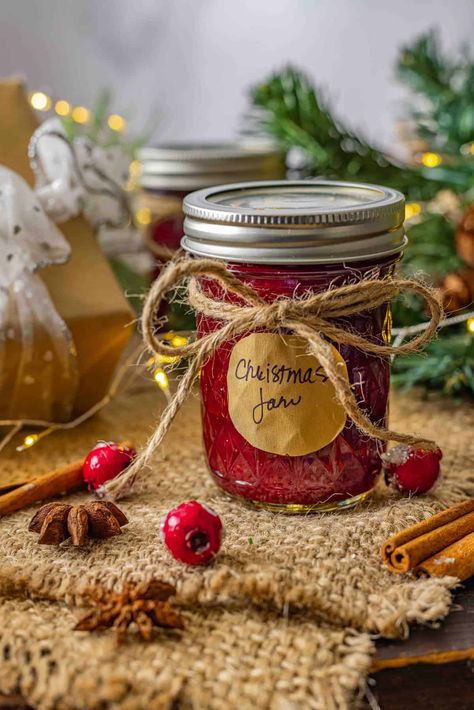 This Sweet Christmas Jam is a festive blend of tangy cranberries, sweet strawberries, and warm holiday spices that capture the essence of the season. Perfect as a thoughtful homemade gift or a delicious addition to your holiday appetizers, this jam is bursting with flavor and holiday cheer. Spiced Christmas Jam Recipes Homemade, Christmas Spice Jam, Jam Gift Basket Ideas, Jam Gift Basket, Spiced Christmas Jam, Holiday Jam, Gathering Recipes, Home Made Jam, Christmas Chutney