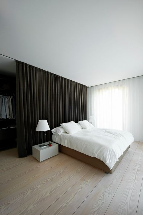 Image 16 of 16 from gallery of House A / Vaillo & Irigaray + Beguiristain. © Iñaki Bergera Closet Behind Bed, Ideas De Closets, Closet Curtain, Curtain Minimalist, Curtains Behind Bed, Room Divider Curtain, Minimalist Bedroom Design, Bed Curtains, Bedroom Wardrobe