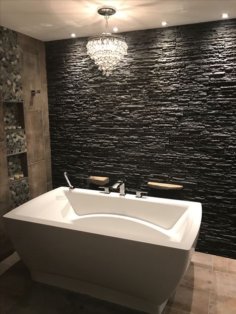 Black Rock Wall Interior, Stacked Stone Bathroom Wall, Stacked Stone In Bathroom, Stacked Stone Bathroom, Dreamscape Bathroom, Black Stacked Stone Fireplace, Black Stone Fireplace, Outdoor Shed Ideas, Summerlin Las Vegas