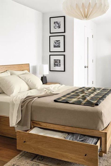 Discover the best storage beds to buy now for an organized and streamlined space. From elevated beds to pull-out drawers, rest easy knowing your items are out of sight. A bed with hidden storage is the perfect solution for small bedrooms and cramped studio apartments.#bedroomdecorideas #homedecorideas #cozybedding #marthastewart Best Storage Beds, Beautiful Bed Designs, Bed Bases, Bed Frame Design, Wooden Bed Design, Bed Design Modern, Bed Storage Drawers, Bedroom Bed Design, Bed Furniture Design