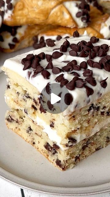 510K views · 46K likes | Theresa Marie Krunev on Instagram: "I Cannoli love you🩷💌🍰

This Cannoli Cake only takes 30 minutes to bake and is the perfect last minute Valentine’s Day Cake! It’s super moist and we love the chocolate chips inside the cake. Full recipe below. 

Cake:
* 2 1/2 cup all purpose flour
* 2 1/2 tsp baking powder
* 1/2 tsp salt
* 1 3/4 cup granulated sugar 
* 12 tbsp unsalted butter, room temp
* 3 eggs, room temp
* 2 1/2 tsp vanilla extract @singingdogvanilla 
* 1 cup buttermilk 
* 1 cup mini chocolate chips 
Cannoli filling:
* 32 oz. Whole Milk Ricotta, strained, dried 
* 3/4 cup powder sugar
* 1/4 tsp vanilla extract 
* 1/2 cup mini chocolate chips 
* 2 cannoli shells 
Extra mini chocolate chips for topping of cake 
Instructions:
* Preheat oven to 350° F. Line two 9 Mini Cake Pan Recipes, Valentines Cocktails Drink Recipes, Cannoli Cake, Cannoli Filling, Delish Cakes, Mini Cake Pans, Square Cake Pans, Chocolate Sweets, Cannoli