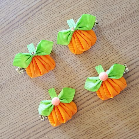 *Description:* Add a touch of autumn charm to your little one's hairstyle with this adorable pumpkin hair clip! Made from high-quality ribbon. This clip features a bright orange pumpkin with a green stem and delicate details. Perfect for fall festivals, Thanksgiving, Halloween, or everyday wear during the cozy season. *Details:* - Clip type: Toothed hair clip - Size: Approximately 2 inches (5 cm) tall and 1.5 inches (3.8 cm) wide - Color: Bright orange with green stem - Suitable for: Little girls' hair, ages 3-12 *Shipping:* - Ships within 1-3 business days - Packaged in a small pouch *Variations:* - Single clip - Set of 2 clips *Keywords:* pumpkin hair clip, fall hair accessory, little girl hair clip, autumn hair clip, Halloween hair clip, orange pumpkin, green stem. Fall Hair Bows Ideas, Thanksgiving Bows For Hair, Fall Felt Hair Clips, Pumpkin Hair Clip, Fall Hair Bows, Pumpkin Hair, Thanksgiving Hair Bows, Thanksgiving Hair, Thanksgiving Bow