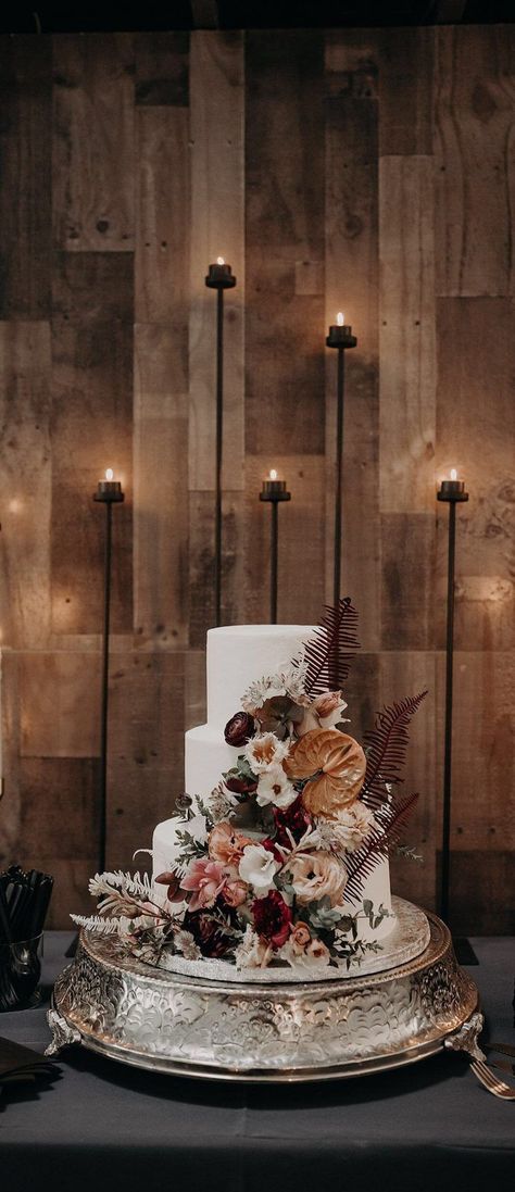 Aly and William’s Urban Chic Wedding with a Botanical Industrial Theme… Taper Candle Decor, Industrial Wedding Cake, Industrial Themed Wedding, Cake Florals, 3 Tier Wedding Cake, Wedding Cake Options, Industrial Wedding Decor, Wedding Cake Display, Industrial Chic Wedding