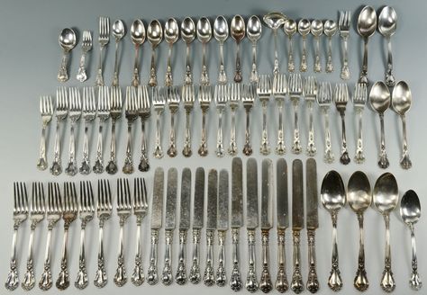 Realized Price: $2,040.00 Older set of Gorham sterling flatware in the Chantilly pattern. 68 pcs including 8 dinner forks, 8  luncheon forks, 8 teaspoons, 6 dinner knives, 6 luncheon knives (all knives with silverplated blades), 8 small salad forks, 6 fish forks, 4 chocolate spoons, 3 table/serving spoons, 1 gravy ladle, 1 junior/tea fork, 1 pickle fork, 1 infant spoon and a baby spoon & fork. Most monogrammed M. 66.22 oz troy. Housed in a mahogany box Baptism Presents, Pickle Fork, Chocolate Spoons, Baby Spoon, Salad Fork, Dinner Fork, Spoon Fork, Silver Spoons, Serving Spoons