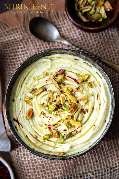 Shrikhand is an Indian sweet dish made using thick yogurt and powdered sugar. It is flavored with cardamom and saffron and garnished with pistachios for that crunch.  #shrikhand #dessert #indiandessert #indiansweet #gudipadwa #ganpatifestival #ganeshchaturthi Indian Yogurt, Shrikhand Recipe, Chilli Cheese Toast, Thick Yogurt, Yogurt Dessert, Burfi Recipe, Sweet Dumplings, Sweet Dish, Sweet Dips