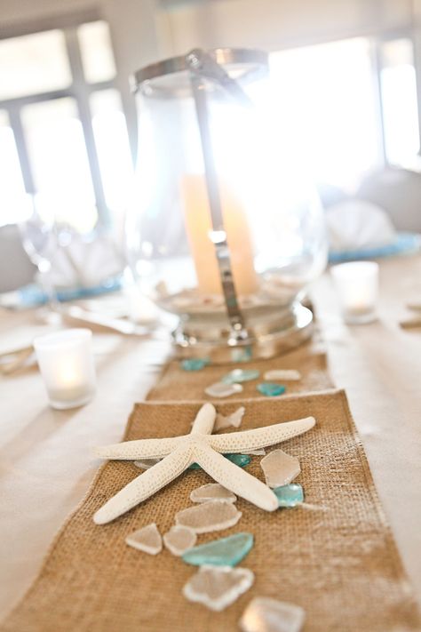 Coastal Beach Party Theme, Rustic Beach Wedding Table Decor, Simple Beach Centerpieces, Beach Wedding Decorations Reception Table Arrangements, Ocean Theme Wedding Centerpieces, Classy Beach Theme Party, Beach Themed Table Centerpieces, Beach Theme Wedding Shower Ideas, Beach Wedding Tablescape