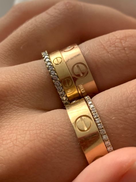 #cartier #cartierlove #cartierhighjewelry #cartierlovecollection #gold #diamond #ringstack #rings #aesthetic #christmas #goldring Cartier Love Ring, Expensive Jewelry Luxury, Dope Jewelry, Cartier Jewelry, Classy Jewelry, Expensive Jewelry, Jewelry Lookbook, Stacked Jewelry, Cartier Love