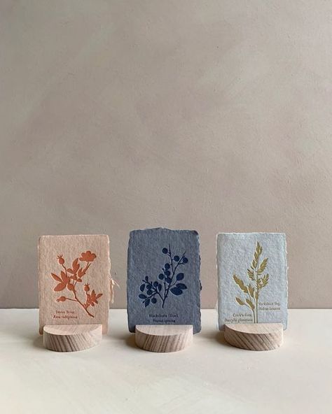 Lauren Smith on Instagram: "Three new Botanical Mini prints 🌹🫐🌾 Perfectly petite and delightfully collectible they make for great stocking fillers! And let me tell you, these are supper affordable little treats for gifting (or keeping) and I even sourced some lovely handmade wooden stands if your struggling to find cheap ways to display your art or want an interim while you save up for fancy framing. #reliefprintmaking #reliefprint #artprints #handprinted #printedbyhand #artprint #botanical # Mini Art Prints, Wooden Art Handmade, Diy Stocking Fillers, Mini Gifts, Lauren Smith, Handmade Paper Art, Relief Printmaking, Handmade Packaging, Make Do And Mend