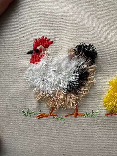 Rooster fringed fluffy chenille farm bird small machine embroidery designs awesome fringe fur chicken Rooster design fringe in the hoop Sizes 3 inches 3.5 inches 4 inches 4.5 inches 100 % safe to wash. The design has a special seam holding fringe in place. It is easy. Embroider the design as usual. Large satin stitches will be loose. Once you complete stitching the design, turn over your hoop to see a reverse side, and cut the bobbin thread, along the large satin stitches. Turn the hoop back ove Large Embroidery Hoop Ideas, Chicken Embroidery Patterns, Fur Embroidery, Chicken Embroidery, Fluffy Chicken, American Embroidery, Rooster Design, Learning To Embroider, Crochet Christmas Gifts