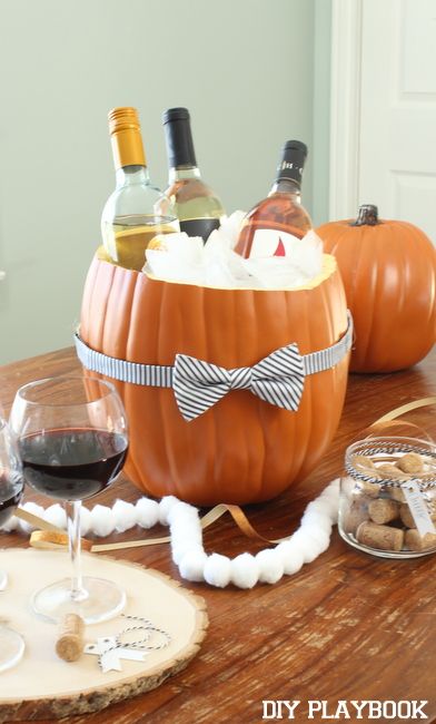 Use a hollowed out pumpkin (real or fake!) for your fall party. A great idea to keep those beverages cold in an adorable way. Get ready for autumn with this easy DIY. Pumpkin Carving Party, Diy Donuts, Diy Playbook, Thanksgiving Decorations Diy, Harvest Party, Creative Pumpkins, Pumpkin Party, Halloween Party Diy, Thanksgiving Parties