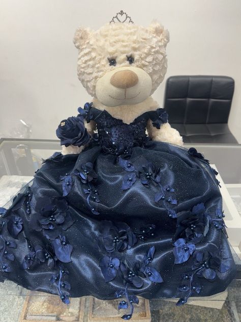 "Quinceañera/Sweet 16  teddybear in a handmade Navy blue dress. \"Mis XV años or Sweet 16\" engraved on teddies foot.  This is a made to order product.  Can be made in any other color upon request." Quincenera Blue Dress, Navy Blue Masquerade Quince, Navy Blue Dress Quinceanera, Navy Blue Theme Quinceanera, Navy Blue Xv Theme, Quince Dress Dark Blue, Quince Decorations Navy Blue, Quinceanera Navy Blue, Navy Sweet 16