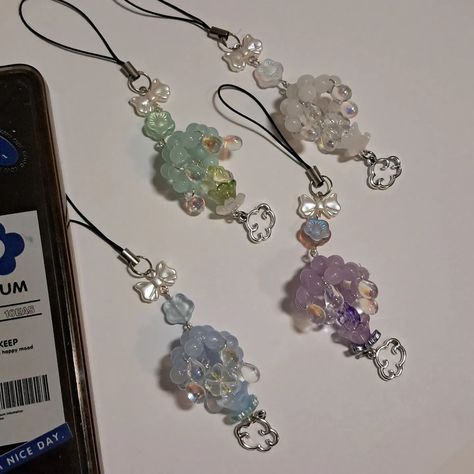 Cloud Phone Charms☁️ _ ✿ Price: $12.50 each + shipping ✿ Available in white, blue, green, and purple _ ✿Made with: glass beads, acrylic beads, phone charm strap landyard, zinc alloy charm(s), and stainless steel tarnish-resistant wire _ Available on my Etsy. Link in Bio ~ 🤍 _ _ _ _ _ #accessories #jewelry #jewelrymaking #bracelets #charmbracelets #beadedjewelry #beadedbracelets #beadsjewelry #beads #fyp #fypシ #explore #explorepage #beadtok #handmadejewelry #acubifashion #acubijewelry #... Cloud Phone, Accessory Inspo, Phone Charms, Phone Strap, Phone Charm, Acrylic Beads, Accessories Jewelry, Bibs, Green And Purple