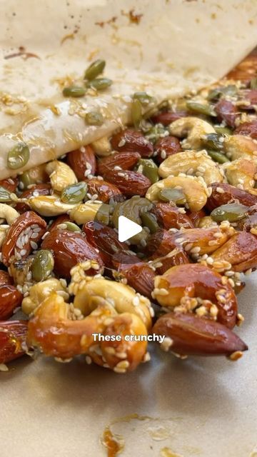 Atoosa on Instagram: "Who else wants to make these? 🙋🏼‍♀️🙋🏼‍♀️🥜Nut &seeds cluster bites, snack or yoghurt topper?🤔 how would you eat these?🤗

Reasons to love this recipe:
✅ they are so addictive 
✅ super easy to make
✅ it’s a delicious way to introduce a variety of plants (nuts) into your daily routine
✅ wholesome ingredients 
✅ great as a snack or as a yoghurt topping 

Ingredients: 
100g cashews
100g almonds
50g pumpkin seeds
15g sesame seeds
40g maple syrup 
1/4 tsp salt

Instructions: 
add all the ingredients to a bowl and mix well.

Line some baking paper on a tray and spread the nut mix into a flat uniform square.

Bake for 10 mins at 180C.

Let it cool down completely before removing from the baking paper. Break down into smaller bites and enjoy 🤗 #imemyself #i’m #selfie #ra Seed Mix Snack, Raw Peanuts Recipes Snacks, Salted Almonds, Nut Clusters, Brittle Recipes, Nut Recipes, Nuts And Seeds, Cracker Recipes, Healthy Sweets Recipes