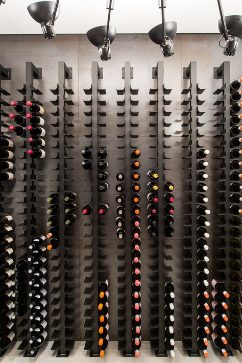 How beautiful is this? A double sided cradle makes the most of utilising space, and the result is a very pleasing, modern and contemporary display. Wine Rack Inspiration, Wine Cellar Inspiration, Wine Store Design, Wine Cellar Wall, Contemporary Wine Racks, Contemporary Wine Cellar, Bar Lounge Design, Modern Wine Rack, Wine Rack Design