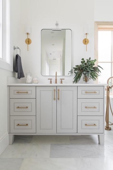 Brass Hardware Bathroom, Curved Vanity, Gold Bathroom Fixtures, Bathroom Cabinet Colors, Light Grey Bathrooms, Grey Bathroom Cabinets, Light Gray Cabinets, Silver Bathroom, Grey Bathroom Vanity