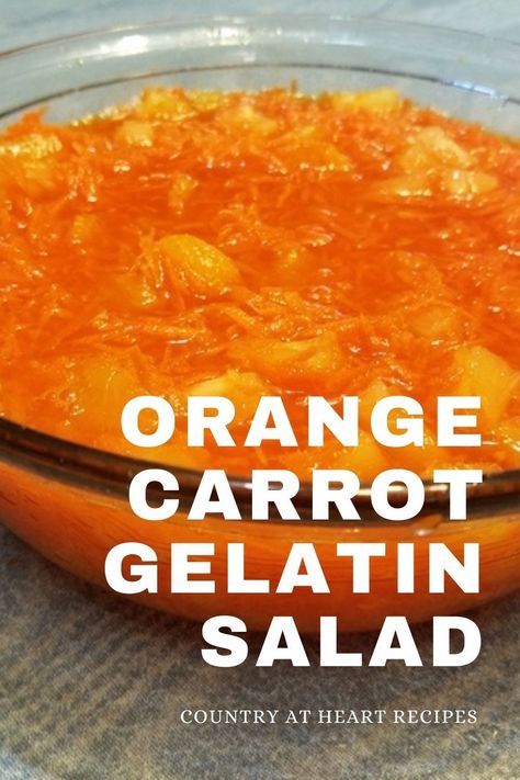 Orange Carrot Gelatin Salad is a family recipe we enjoy at summer gatherings that's perfect for picnics and barbecues. Filled with juicy pineapple and mandarin oranges with shredded carrots surrounding it in an encasement of orange gelatin, it's certain to please kids of all ages! #orangecarrotgelatinsalad #salads #pineapple #mandarinoranges #jello #carrots #summerfoods #picnics #vintagerecipes #countryatheartrecipes https://countryatheartrecipes.com/2021/05/orange-carrot-gelatin-salad/ Orange Jello With Carrots And Pineapple, Orange Watergate Salad, Salad Recipes With Carrots, Orange Jello Recipes, Carrot Jello Salad, Carrot Pineapple Salad, 1950s Cooking, Recipes With Carrots, Gelatin Salads