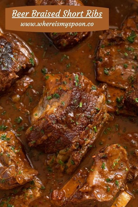 These melt-in-your-mouth, flavorful beer-braised short ribs with Guinness are best served on a bed of creamy mashed potatoes. This is comfort food at its best! #whereismyspoon #beershortribs #shortribsrecipe #braisedshortribs #cookshortribs #beefshortribs #guinnessshortribs #guinnessribs #guinnessrecipe #stpatricksdayrecipes #stpatricksdayfood Beer Short Ribs Recipe, Short Ribs Dutch Oven, Cooking Beef Ribs, Short Ribs In Oven, Short Rib Recipes Oven, Braised Beef Short Ribs Recipe, Pork Short Ribs, Ribs Recipe Oven, Beer Braised Short Ribs