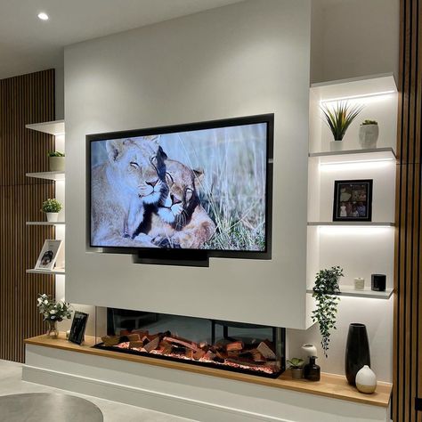 Floating Tv Wall Unit Designs, Tv Above Electric Fire, Asymmetric Tv Wall, Lounge Fireplace Feature Wall, Media Walls With Fire, Fire Under Tv, Living Room Fireplace And Tv, Tv On Chimney Wall, Living Room Built Ins With Fireplace