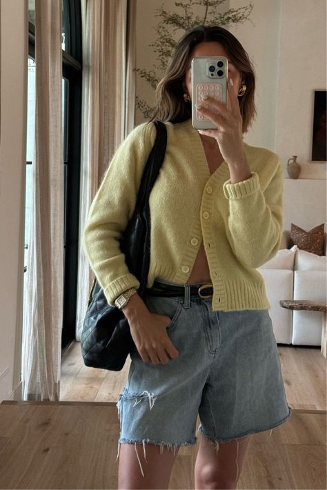 looking for summer outfit ideas with a pop of color? then tap to shop this trendy summer outfit! I'm loving this butter yellow knit cardigan, oversized denim cut offs, black belt, and black tote bag for summer. tap to check out my ltk to shop this trendy summer outfit and find more casual everyday outfit ideas for summer. Shorts And Cardigan Outfit, Yellow Black Outfit, Summer Cardigan Outfit, Pop Of Color Outfits, Orange Cardigan Outfit, Women Cardigan Outfit, Yellow Cardigan Outfits, Cardigan Outfit Summer, Black Cardigan Outfit