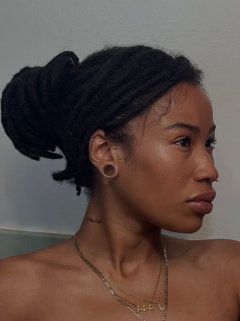 Black woman with locs Gauge Ears Black Women, Gauge Ears Women, Gauged Ears Black Women, Ear Gauges Aesthetic Black Women, Gauged Ears Women Aesthetic, Gauges On Black Women, Thick Short Locs Styles, Locs Tattoo Ink Black Women, Megan Good Locs