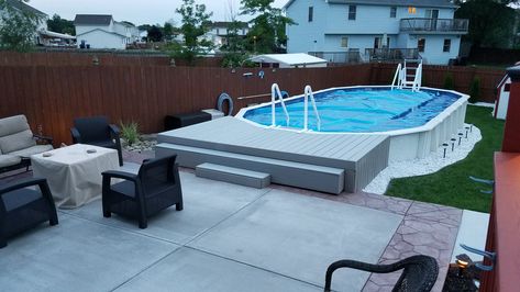 Concrete patio and floating deck to semi recessed above ground pool Cement Pool Ideas, Swimming Pool Tiles Ideas, Deck Bar Ideas, Pool Tiles Ideas, Swimming Pool Designs Luxury, Pool Deck Bar, Cement Pool, Pool Concrete, Stock Tank Swimming Pool