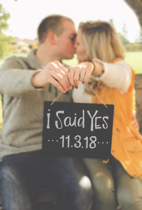 She said Yes! The future groom decided to surprise his girlfriend during our anniversary session. Loving everything about this fall engagment. A must have is showing off that ring with a chalkboard sign with the date of their engagement on it! Click on the photo to see more pictures from this fall engagement session. Repin and like to share these ideas with your followers! Fun Engagement Photos Props, Signs For Engagement Pictures, Engagement Photo Sign Ideas, She Said Yes Engagement Photos, Engagement Photo Signs, Engagement Photos Signs, Engagement Signs For Pictures, She Said Yes Photos, Fall Nails For Engagement Pictures