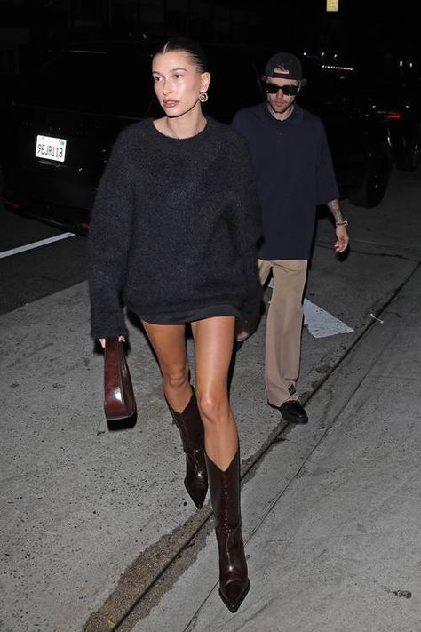 Hailey Bieber Wore Western Boots With a No-Pants Outfit | Who What Wear Justin And Hailey Bieber Street Style, Western Boot Outfit, Western Boots Outfit, Hailey Bieber Outfits, Mode Ulzzang, Hailey Bieber Style, Winter Boots Outfits, Hailey Baldwin Style, Chique Outfit