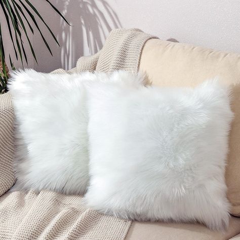 PRICES MAY VARY. 70% Polyester and 30% Acrylic 【Soft and fluffy】 Faux Sheepskin pillow case: the material is high density and super soft faux fur, and the back is crystal super soft fabric。 【Multi-Application】 It Can Be Used for Decorative Pillows of Bed Head, Sofa, Chair, Balcony and Car in Bedroom. Make Your Space More Beautiful. 【Environment Friendly Nontoxic】The Material is Made of Environment-Friendly and Non-Toxic Polyester and Acrylic Fiber. Whether The Elderly, Children or Pets Can Exper White Fuzzy Pillow, Fluffy Cushions Bedrooms, Fluffy Pillows Aesthetic, White Pillows Aesthetic, Fluffy Pillows Bedroom, White Fluffy Pillows, Winter Sleepover, White Fluffy Pillow, Room Decor Pillows