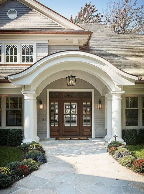 LOVE COVERED ROOF above door. LOVE curved rooftop as well as curve underneath, round pillars, round detail and change in material near peak Arched Entry Doors, Entry Door With Sidelights, Home Designs Exterior, Front Porch Design, Cape House, Casas Coloniales, Front Entrance, Front Door Design, Porch Design