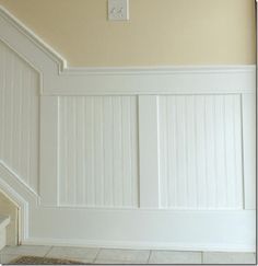 Wainscoting is a really great way to add style and value to your home.  One of the more popular wainscoting styles is beadboard.  Here are 4 tips that will help you in your beadboard process: One o... Brown Wainscoting, Wainscoting Wallpaper, Stairway Wainscoting, Stairs Trim, Wallpaper Hallway, Wainscoting Stairs, Faux Wainscoting, Wainscoting Ideas, Wood Wainscoting