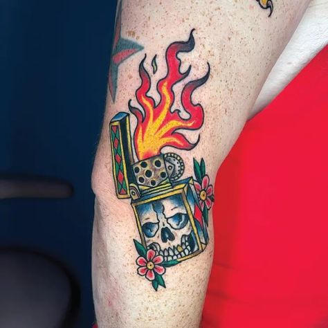 Color Traditional Skull Cigarette Lighter Tattoo Idea & Design on Men Arm Traditional Skull Cigarette Lighter Tattoo Done At Traditional Lighter Tattoo, Zippo Lighter Tattoo, Matchbox Tattoo, Lighter Tattoo, Traditional Skull, Skull Light, Dinosaur Tattoos, Light Tattoo, Flame Tattoos