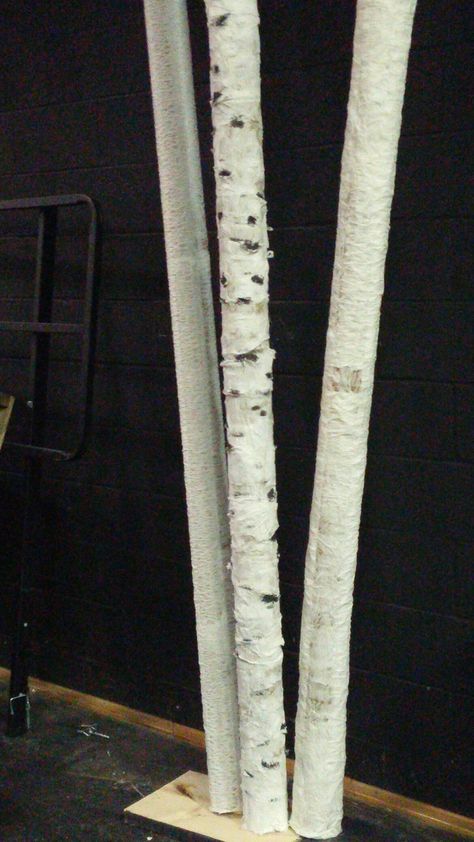 Birch trees made by wrapping toilet paper soaked in diluted glue around carpet tubing.  Detail paint added to center tree. Carpet Tube Ideas, Fake Birch Trees Diy, Theater Camp, Enchanted Forest Baby Shower, Winters Tale, Sleeping Beauty Ballet, Post Prom, Christmas Booth, Forest Room