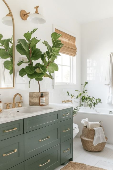 27 Luxurious Gold Bathroom Ideas You’ll Love Bathroom Decor Green Cabinets, Deep Green Bathroom Vanity, Green Cabinets Bathroom Ideas, Green Gold And Wood Bathroom, Sage Master Bath, Green On Green Bathroom, Grey Green Bathroom Vanity, Save Green Bathroom, Brass And Green Bathroom