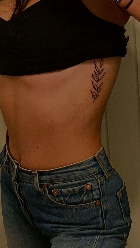 Tattoo Female Ribs, Small Rib Tattoo Placements, Under Ribs Tattoo, Rib Age Tattoo, Vine Tattoos Ribcage, Side Of Ribs Tattoo Women, Tattoo On Hip Bone For Women, Leaf Tattoo On Ribs, Rib Leaf Tattoo