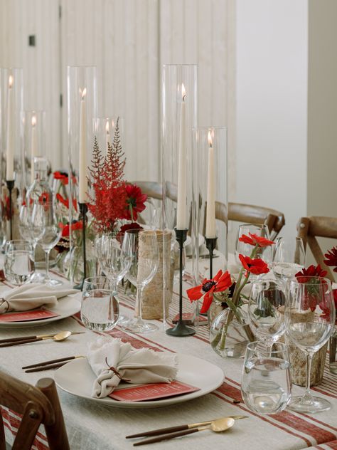 Red anemone, burgundy dahlia, pieris, red astilbe budvases - black candlesticks, white taper candles, aspen votives - farm table centerpiece Red Astilbe, Farm Table Centerpiece, Botanical Wedding Decor, White Taper Candles, Table Florals, Black Candlesticks, Candle Designs, Burgundy Dahlia, Red Wedding Decorations