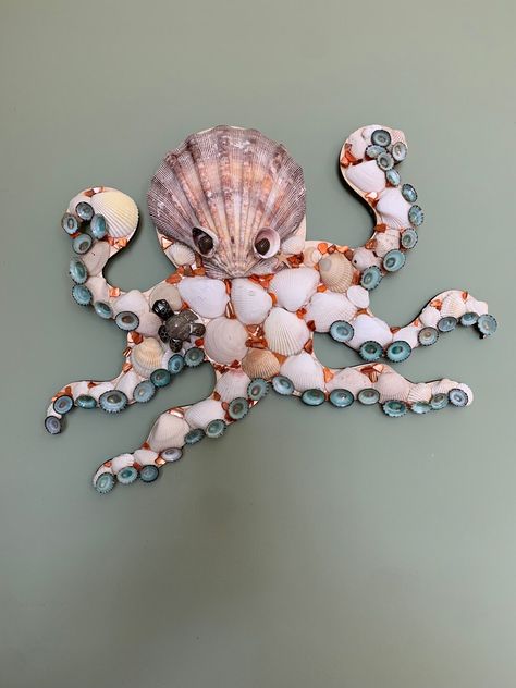 This Wall Hangings item is sold by Deepnorthcrafting. Ships from Oscoda, MI. Listed on Aug 4, 2024 Sea Shell Ideas, Things To Make With Seashells, Shell Collection Display, Seashell Octopus, Seashell Animals, Pottery Barn Hacks, Sea Shell Art, Shells Art, Sea Life Wall Art