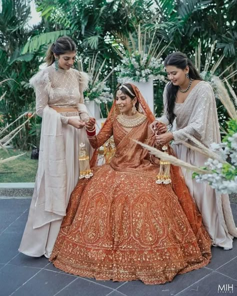 Orange Colour Bridal Lehenga, Rust Color Lehenga, Rust Color Bridal Lehenga, Punjabi Reception Outfit Brides, Rust Wedding Lehenga, Burnt Orange Bridal Lehenga, Rust Lehenga Bridal, Rust Orange Bridal Lehenga, Rust Colour Lehenga