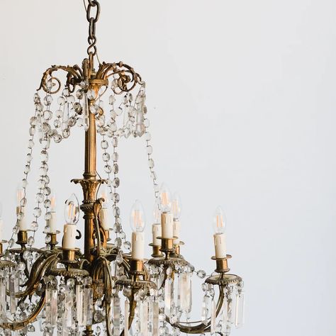 A large crystal chandelier is so typically French. We love the pretty gilded finish of this chandelier's cage, and the delicate crystal… | Instagram Large Crystal Chandelier, Vintage Crystal Chandelier, Elsie Green, Chandelier Vintage, Vintage Wine Glasses, Stoneware Crocks, Vintage Flatware, Vintage Napkins, Vintage Champagne