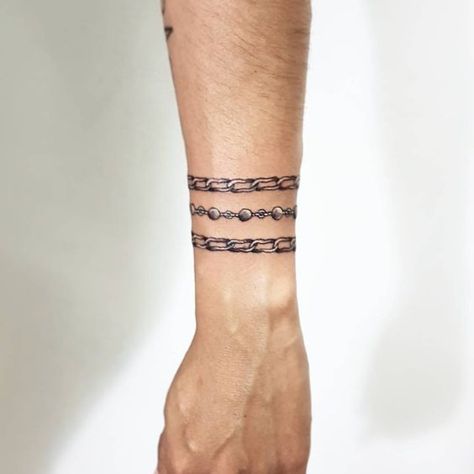 Chain Tattoos on Arm. Universal Tattoo, Chain Tattoos, Wallpapers Jesus, Tattoos On Arm, Bracelet Tattoo For Man, Name Tattoos On Arm, Piercing Art, Wrap Around Wrist Tattoos, Wrist Band Tattoo