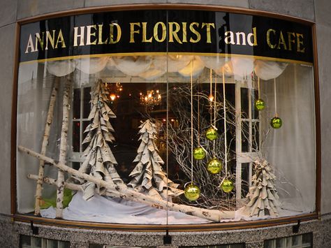 The curved window at the corner of Bryn Mawr Avenue and Sheridan Road, in the Edgewater Glen Neighborhood of Chicago. Isn't it splendid...and the 'trees' are made of rolled newspapers! Winter Window Display, Christmas Shop Window, Holiday Window Display, Window Display Retail, Christmas Windows, Store Window Display, Store Window Displays, Christmas Window Display, Winter Window