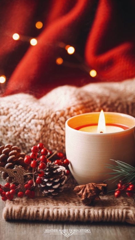 A solitary candle flickers atop a textured place setting adorned with rustic red berries and earthy pine cones. In the backdrop, a cozy red blanket provides warmth, and a string of delicate lights adds a touch of magic. Transform your digital space with the essence of the season – ideal for your Christmas wallpaper or a serene winter lock screen | lock screen wallpaper | winter backgrounds | winter aesthetic Lock Screen Wallpaper Winter, Screen Wallpaper Winter, Winter Lock Screen, Backgrounds Winter, Winter Backgrounds, Red Blanket, Wallpaper Winter, Screen Lock, Candle Glow